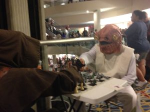 The chess jawa shaking hands with Admiral Ackbar